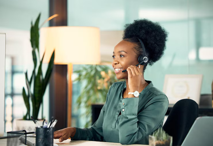 Researcher conducting telephone interviews and surveys in Nigeria for accurate data collection