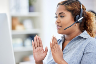 An inteCall center agents wearing headsets conducting multilingual telephone interviews, overcoming language barriers in survey research viewer during a telephone survey session