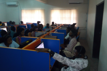 CATI AFRICA call center agents working in a modern office environment conducting telephone surveys across Africa