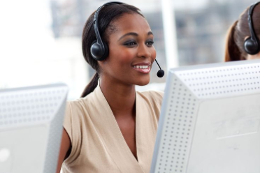 Researcher conducting ethical telephone surveys in conflict settings across Africa.