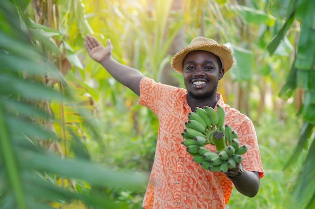 A local Nigerien farmer bearing his farm produce