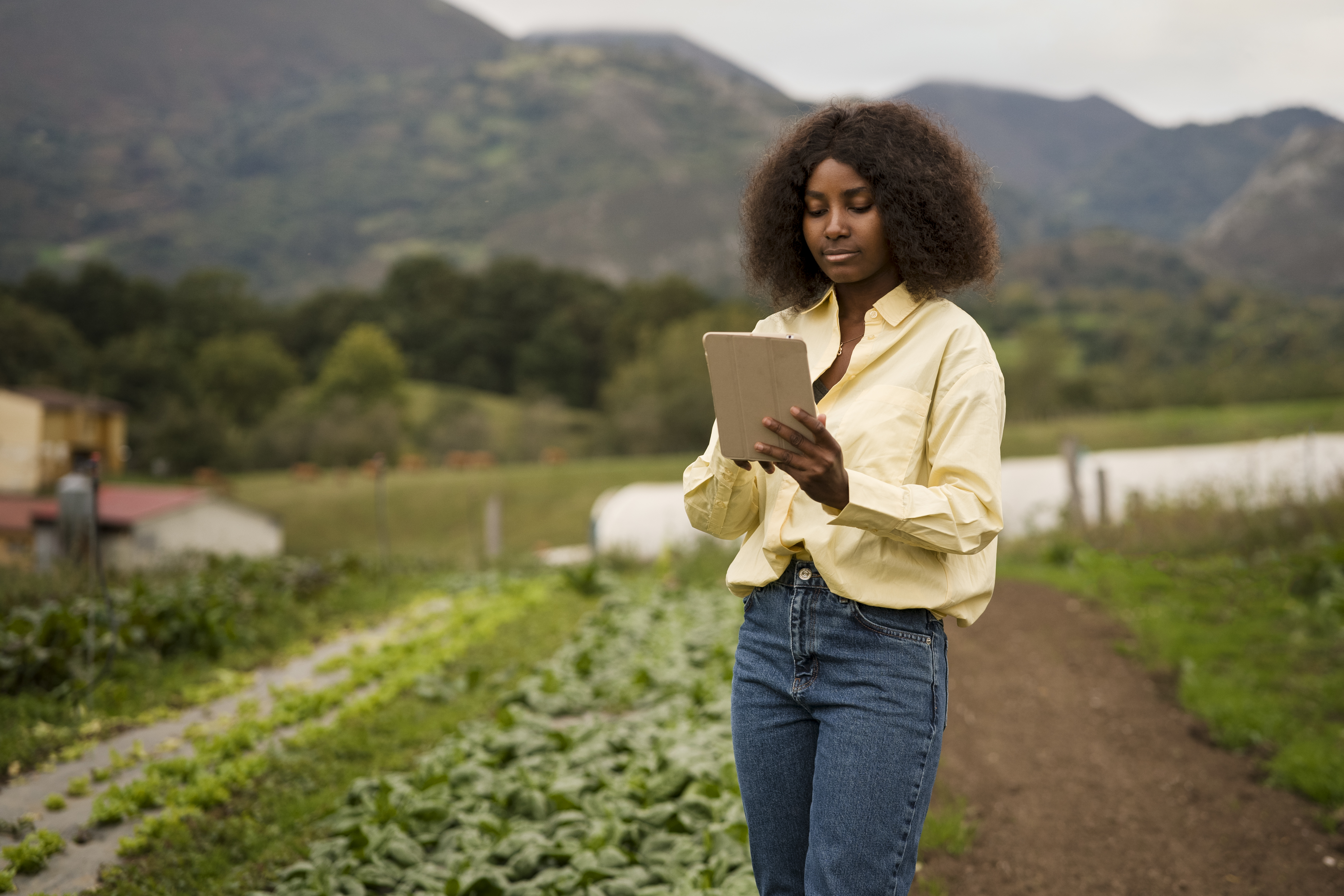 Woman participating in a telephone survey in rural community